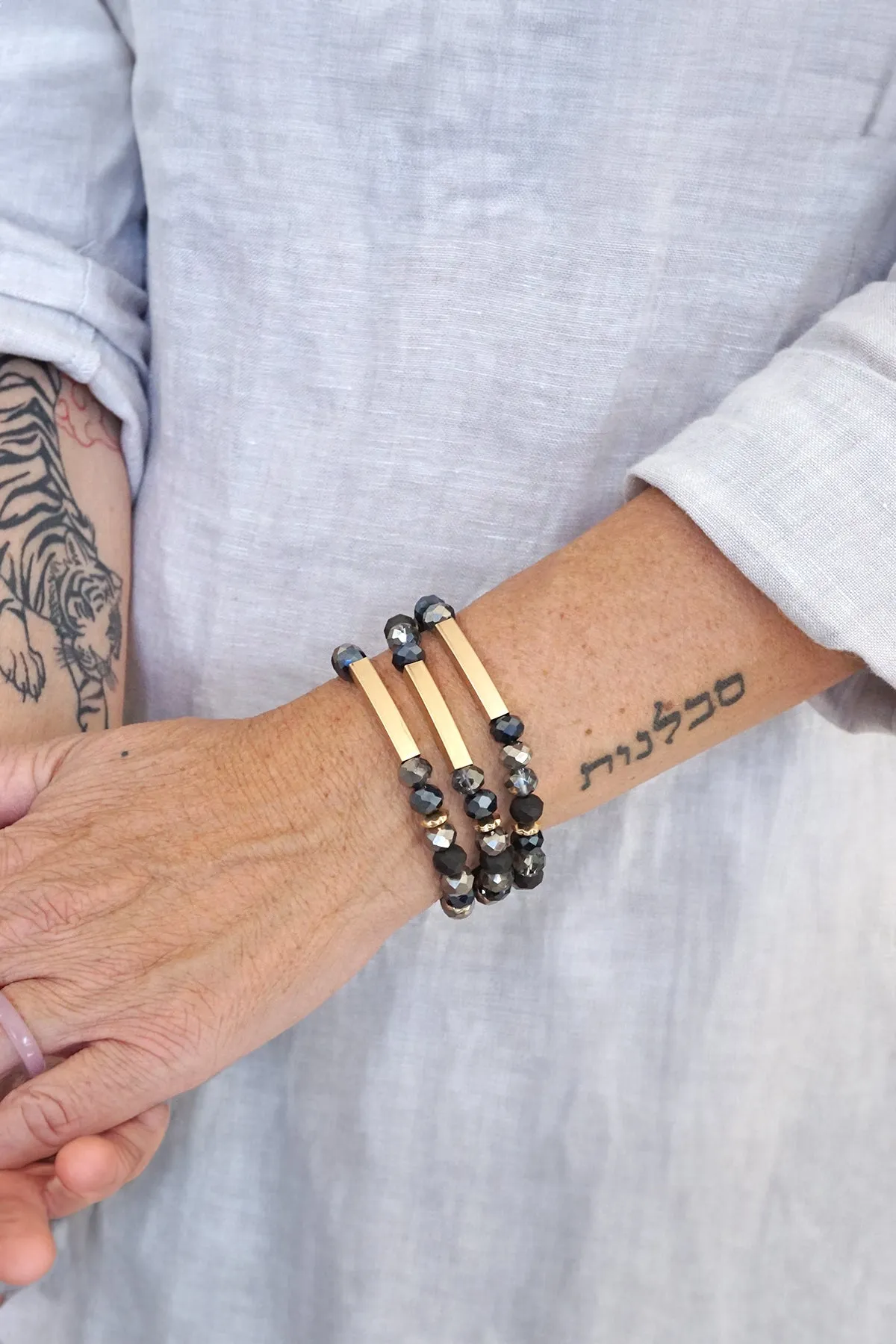 Beaded bracelets set in Black Glass Beads and Gold tubes