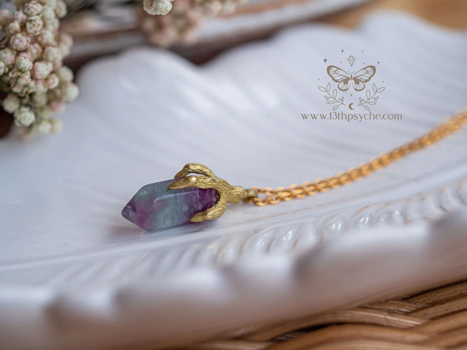 Bird claw and fluorite pendant necklace