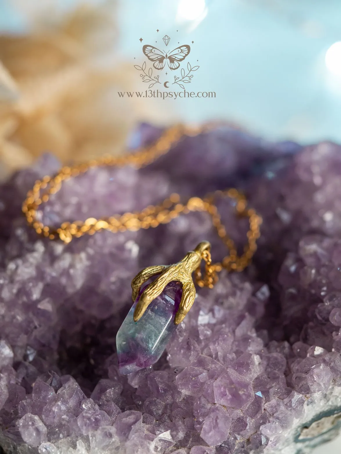 Bird claw and fluorite pendant necklace