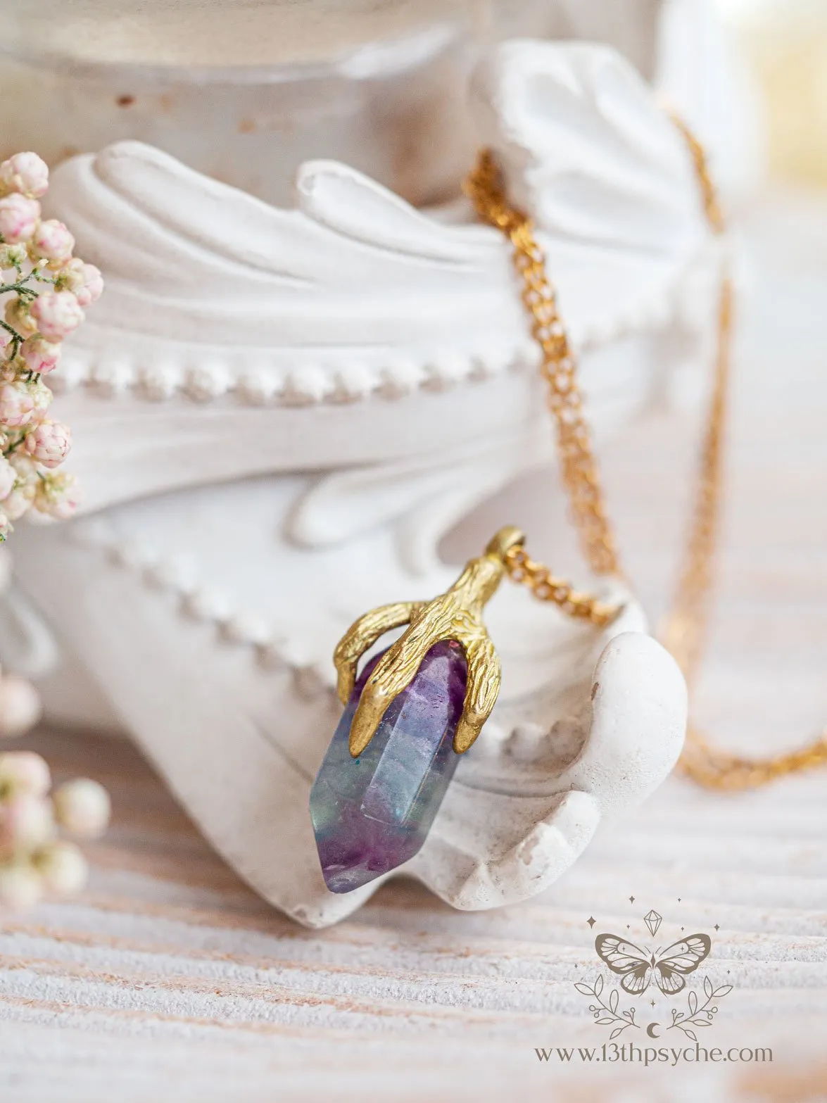 Bird claw and fluorite pendant necklace