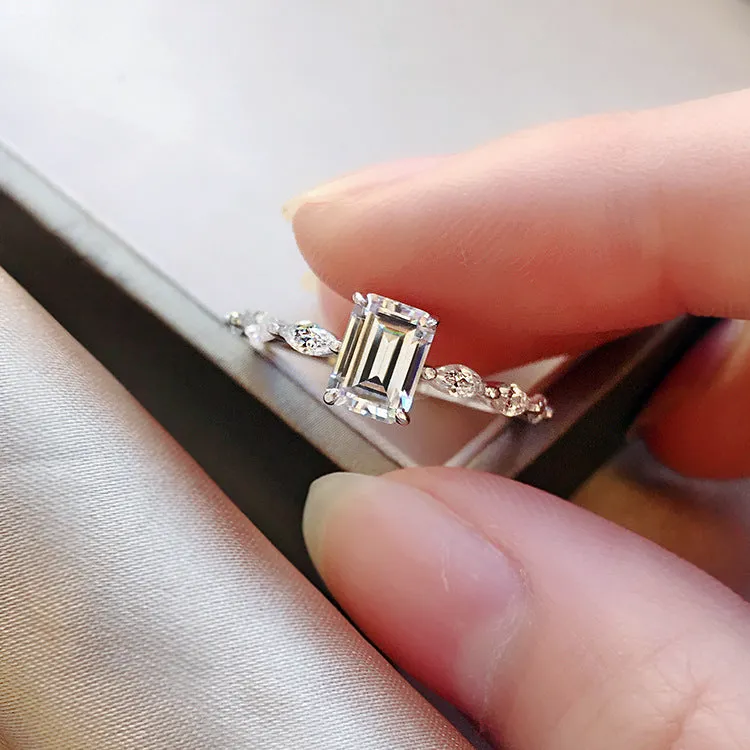 Emerald Cut Moissanite Engagement Ring with Marquise Sides 18K Gold