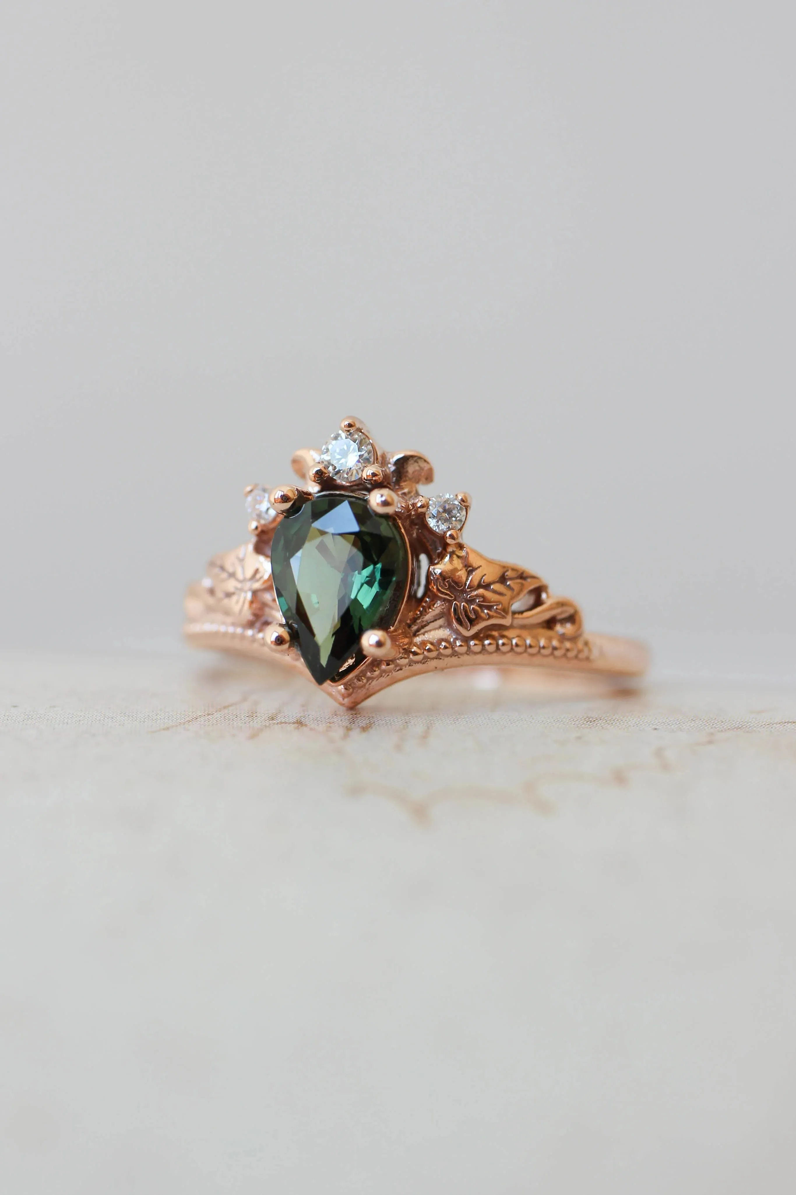 Engagement ring with green sapphire and diamonds / Ariadne pear cut